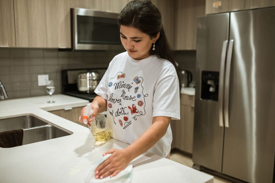 Professional wiping kitchen counter